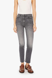 Front view of a person wearing gray high-rise, straight leg, and cropped ankle-length hem
