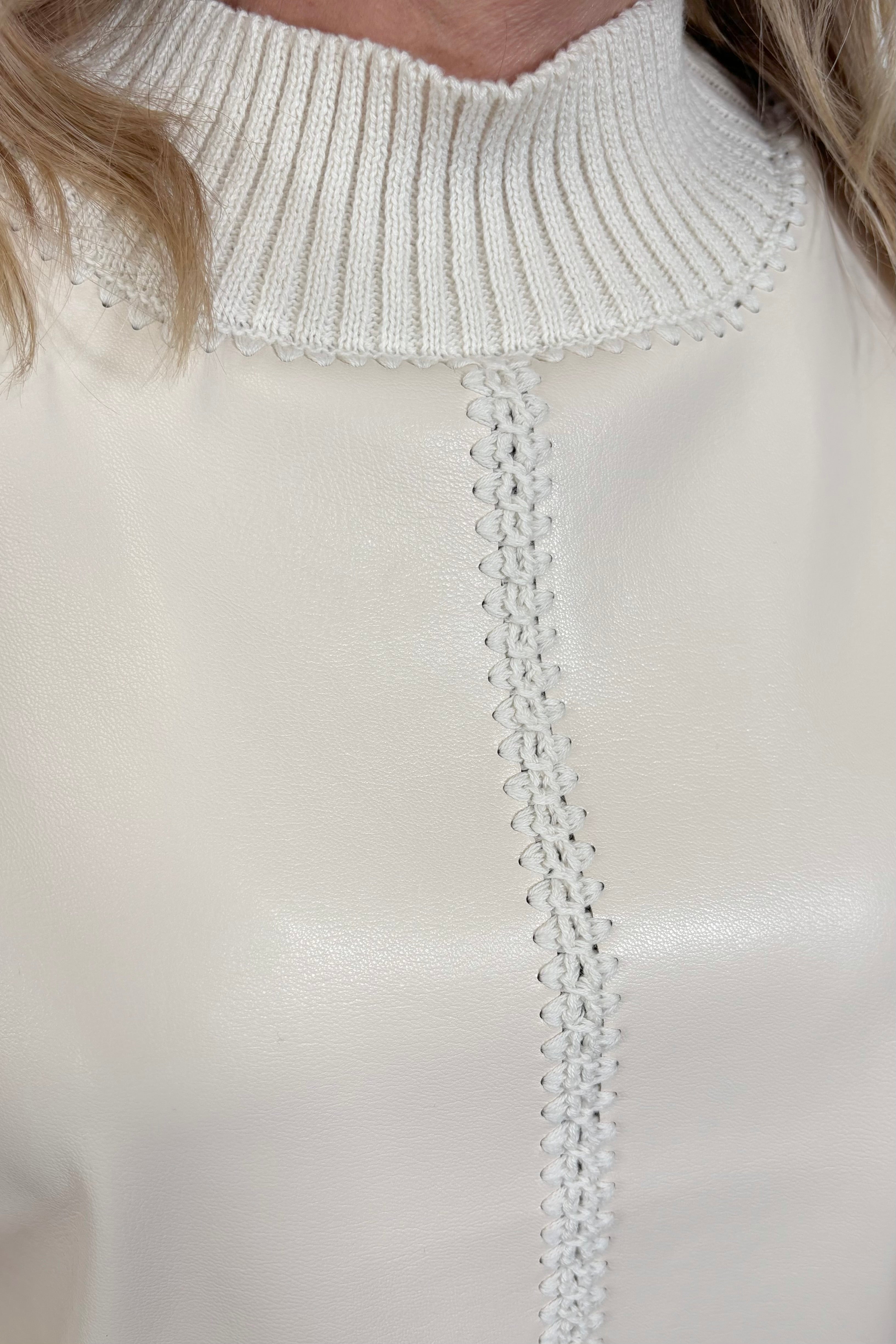 Close-up of of a sleeveless mix media tank top