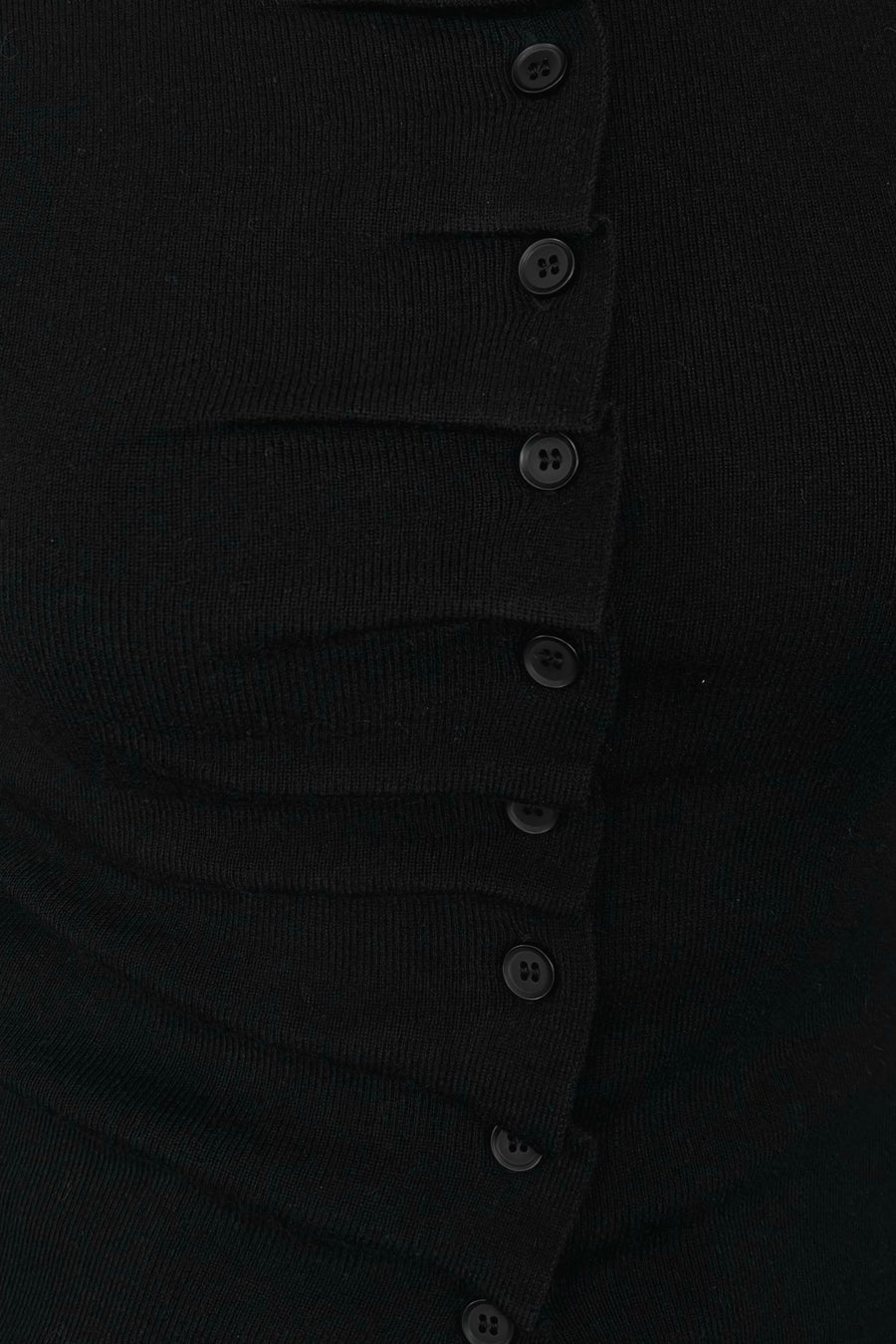 close-up of a black rouched front knit top