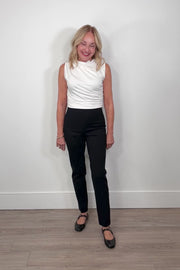 woman wearing a black compression straight leg pant