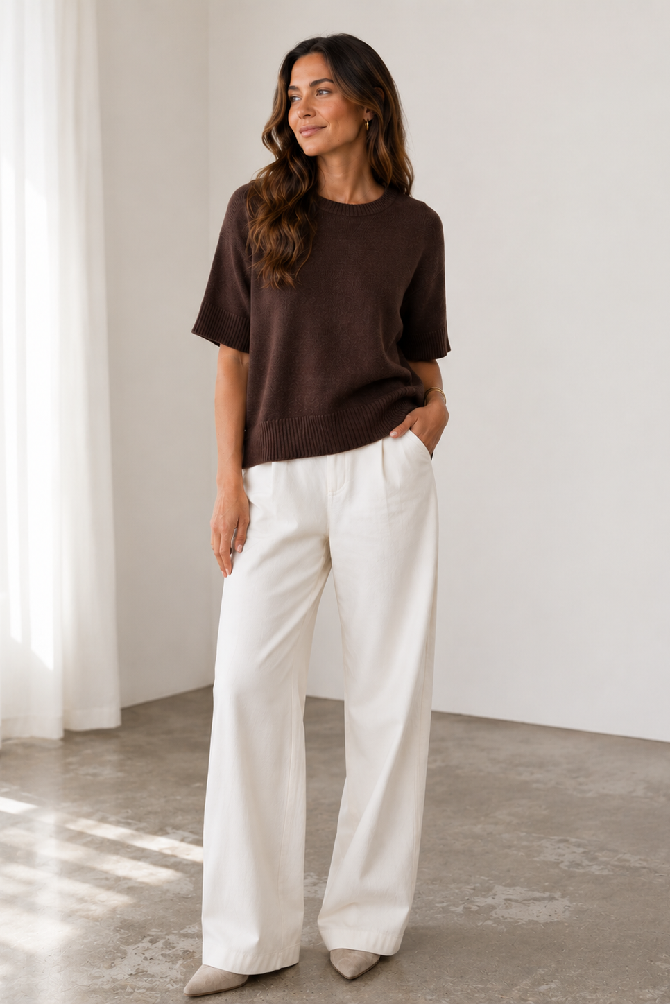 model wearing brown short sleeve crewneck sweater 
