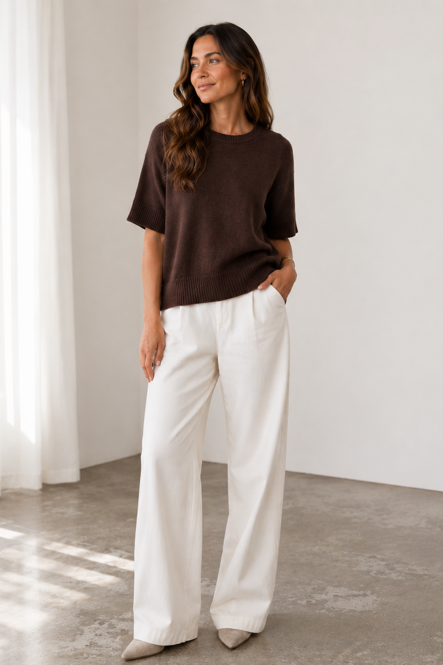 model wearing brown short sleeve crewneck sweater 