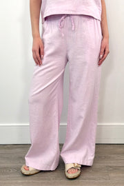 Woman wearingWide leg, cotton wall pant in light pink