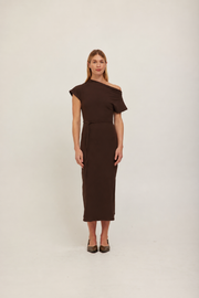 A woman modeling a dark brown off-the-shoulder midi dress with a fitted waist and short sleeves. 