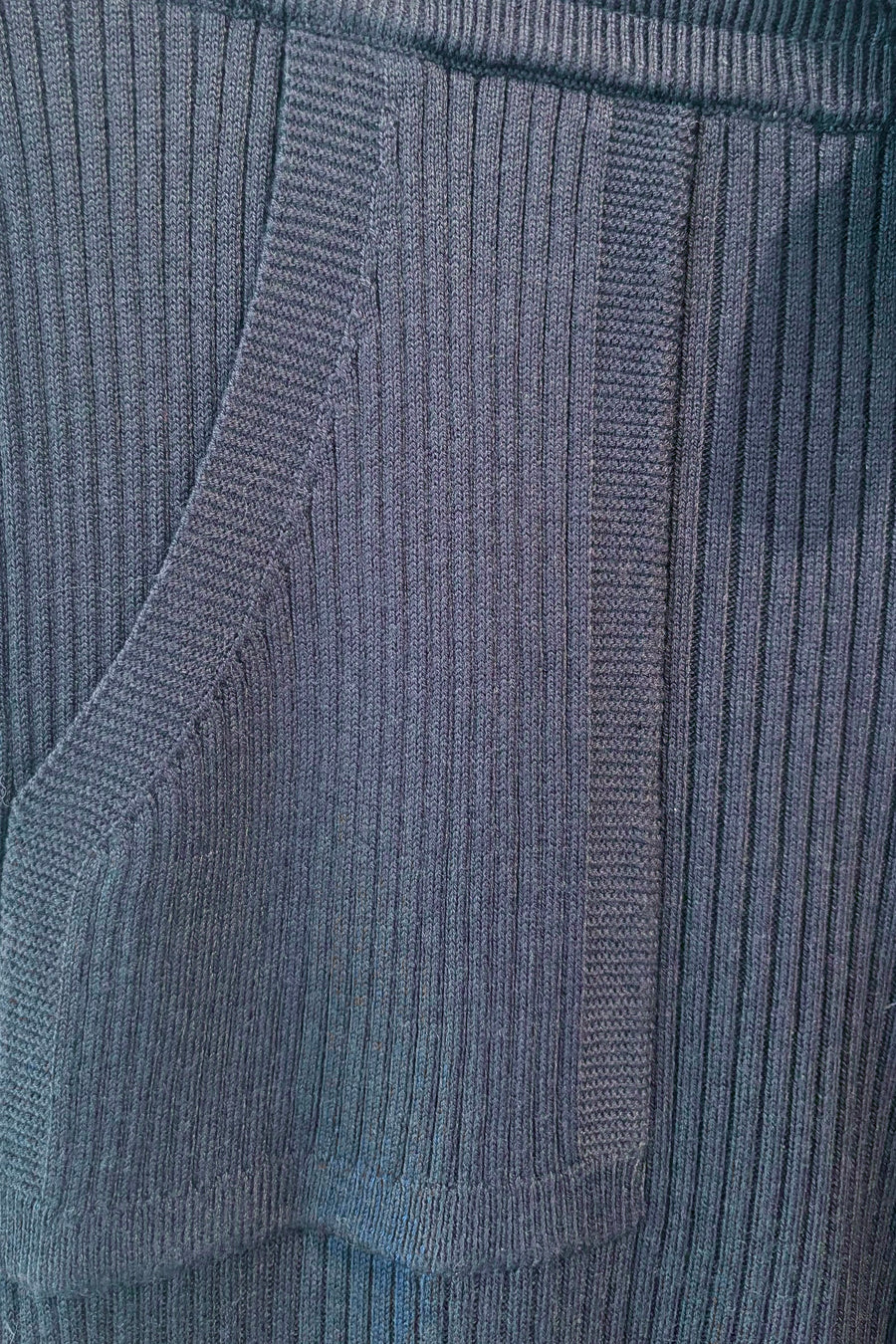 Close up of blue cashmere blend ribbed pants 