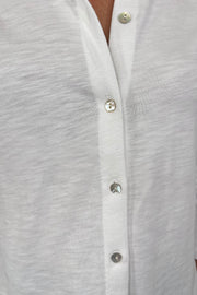 Close-up of a white knit slub shirt