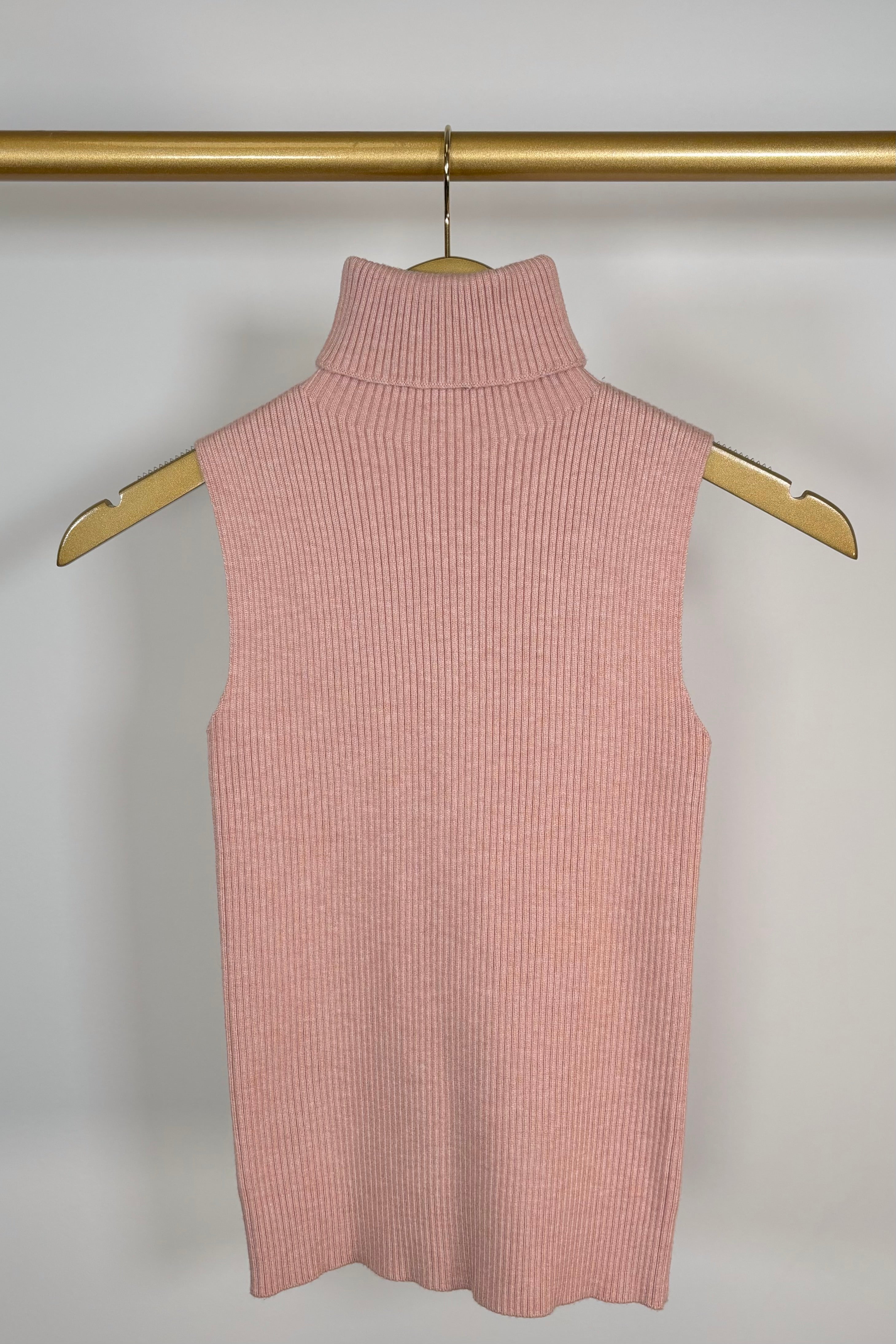 Front view of pink knitted turtleneck tank top