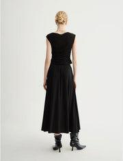 Back view of Woman wearing a black wide shoulder tank top