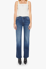 model wearing high waist straight leg blur jeans