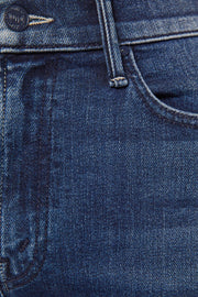 Close-up of blue denim jeans with stitching details