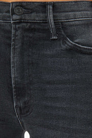 Front zoom in view of a person wearing a washed black, wide leg, high rise, and clean hem jean
