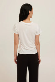 White baby tee with a crew neckline made with soft jersey cotton
