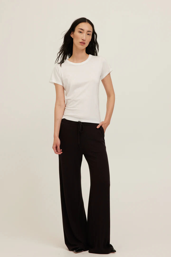 White baby tee with a crew neckline made with soft jersey cotton