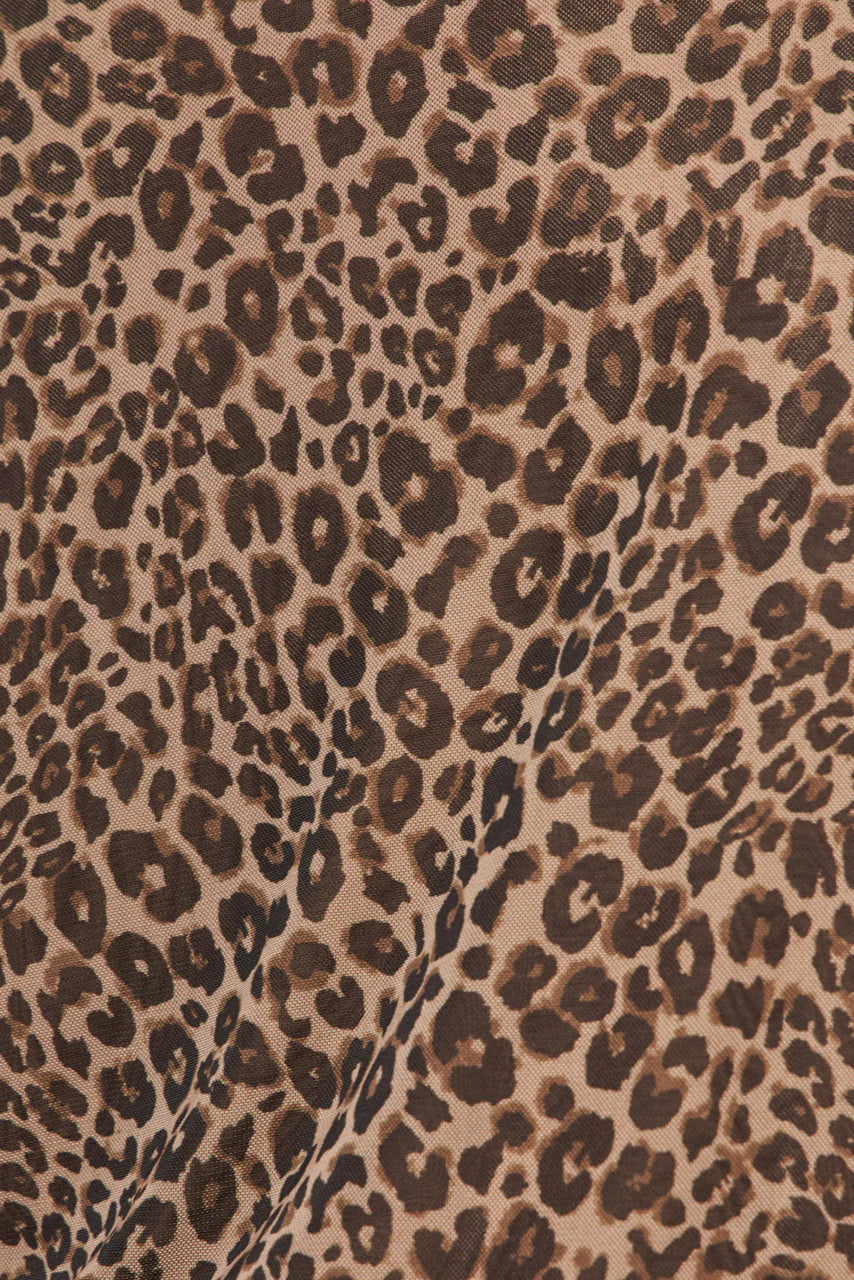 Close-up of the leopard print of a long sleeve mesh top