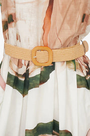 white dress with artistic print. 