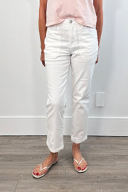 Person wearing white pants with large front pockets