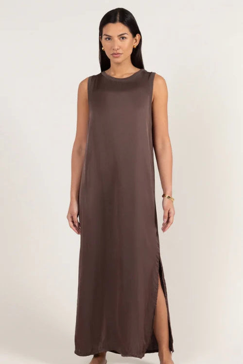 Sleeveless brown maxi dress with a relaxed fit, round neckline, and side slit detail, front