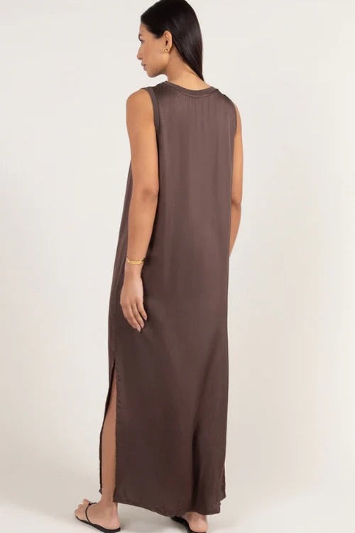 Sleeveless brown maxi dress with a relaxed fit, round neckline, and side slit detail, back