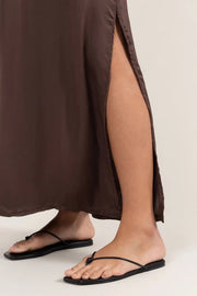 Sleeveless brown maxi dress with a relaxed fit, round neckline, and side slit detail, detail