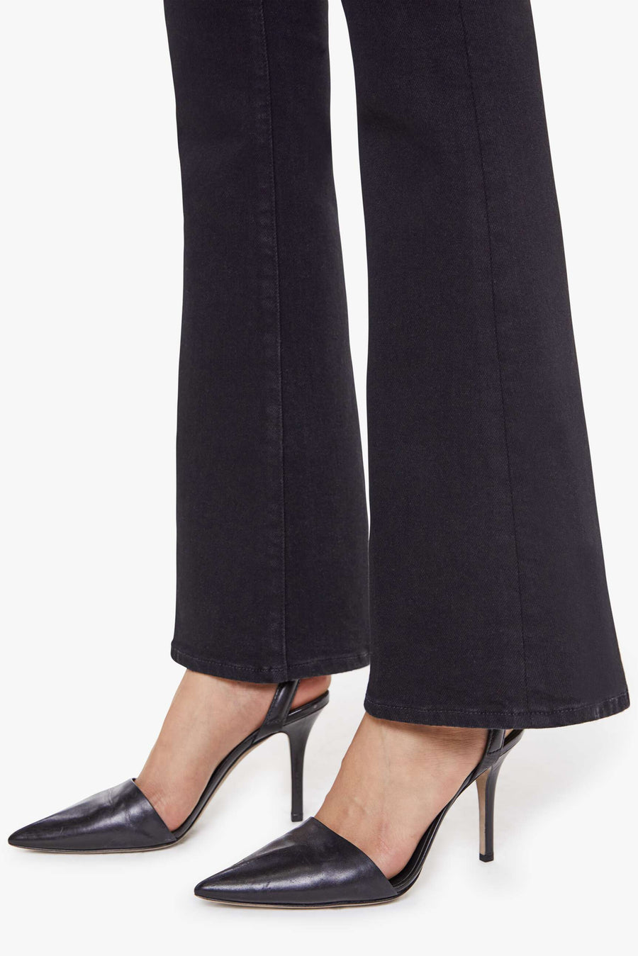 Close-up of the flare of black jeans