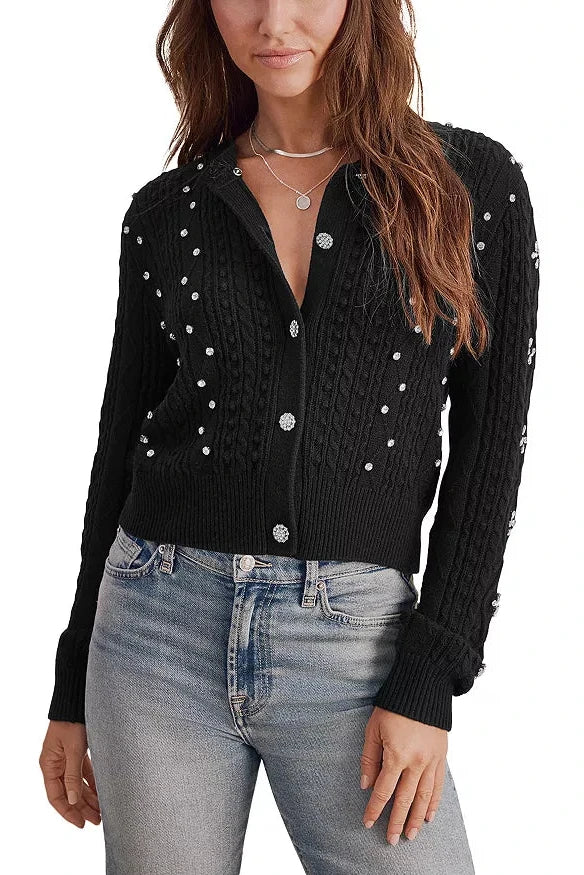 woman wearing black embellished cardigan