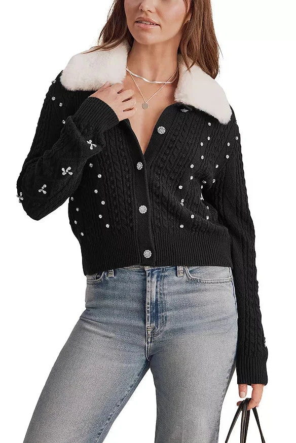 woman wearing black embellished cardigan