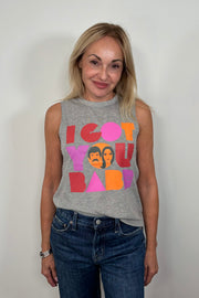 Front facing woman wearing a gray sleeveless tee with “I got you babe” graphic words printed