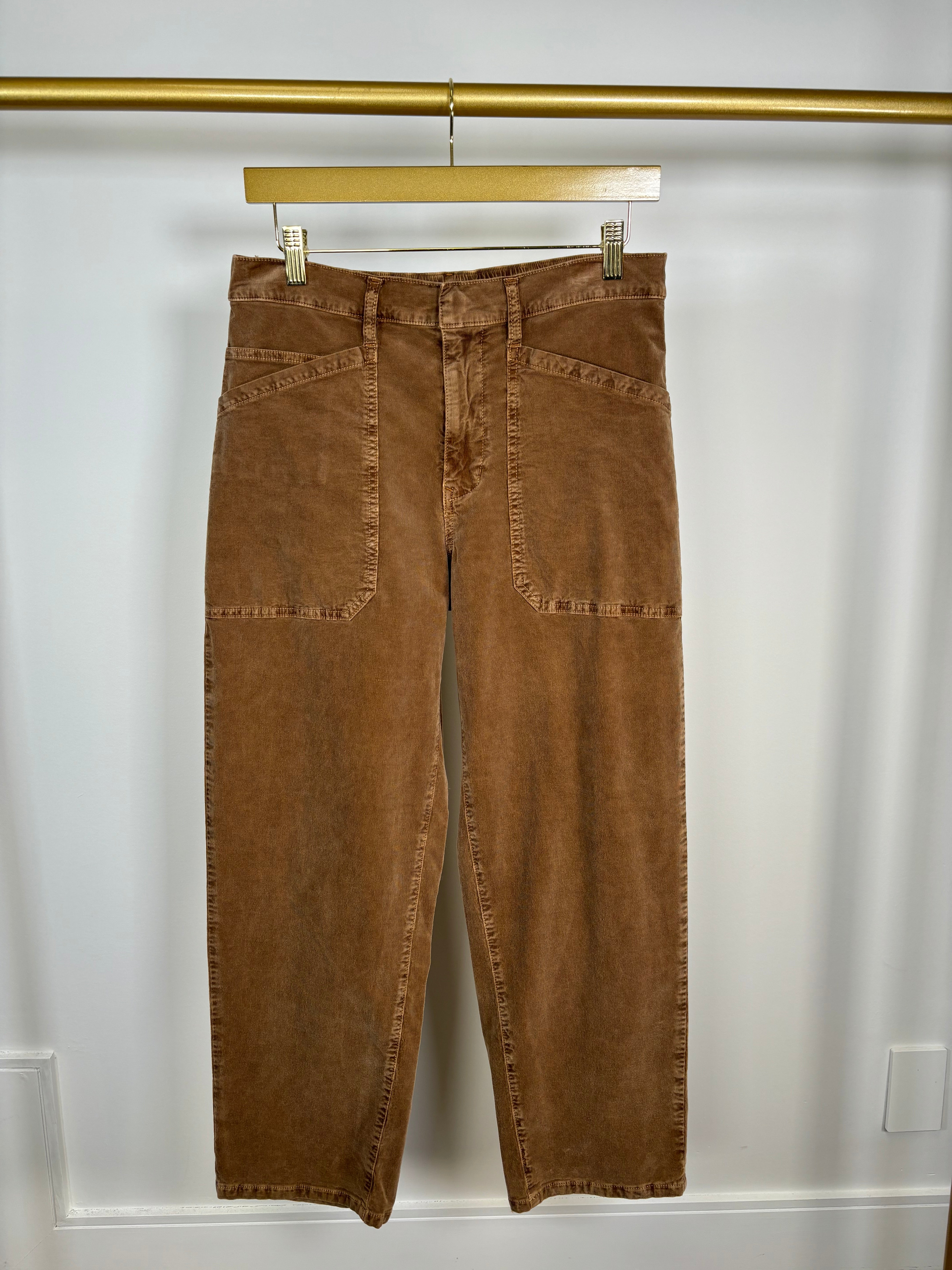 Front view of warm brown corduroy pants