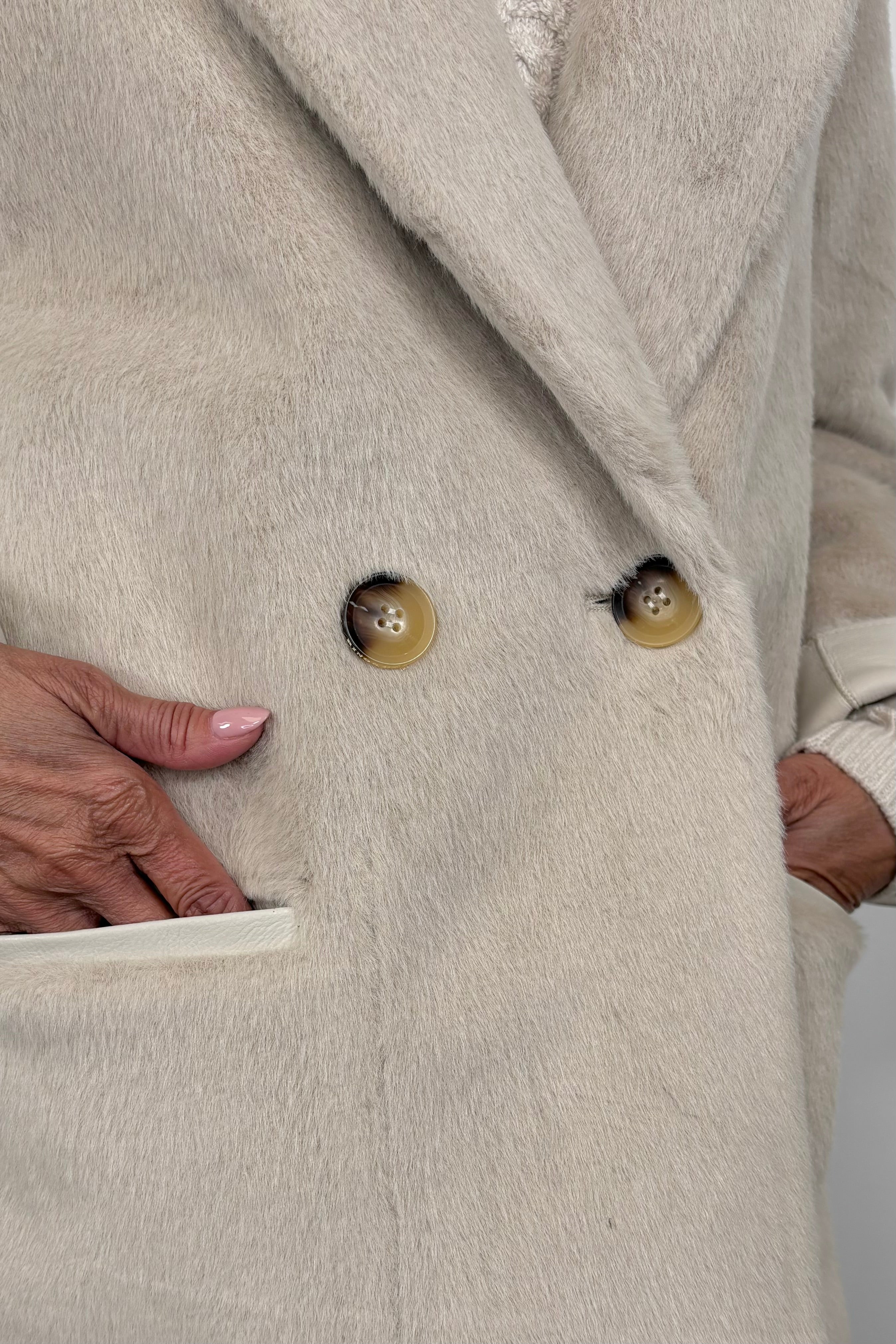 close-up of a fluffy trench coat