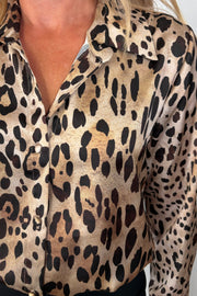 Close-up of a leopard print button down shirt