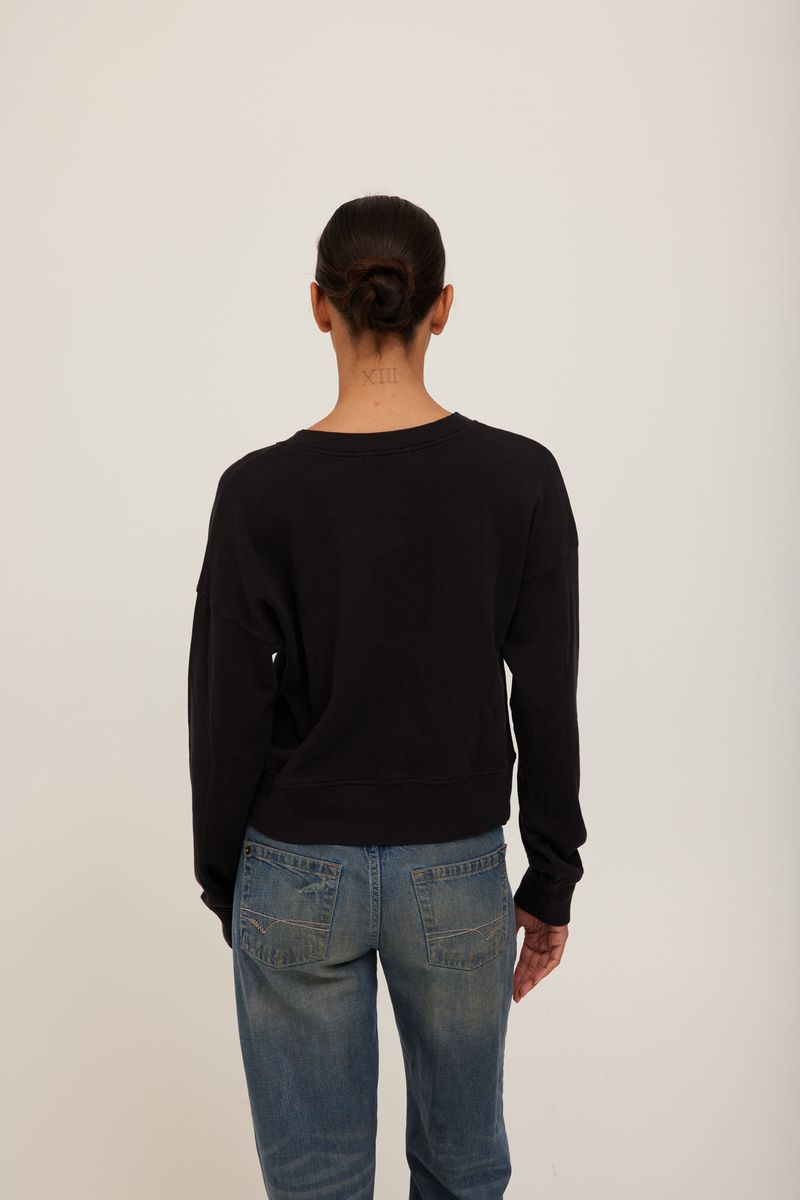 women wearing v-neck pull over sweater