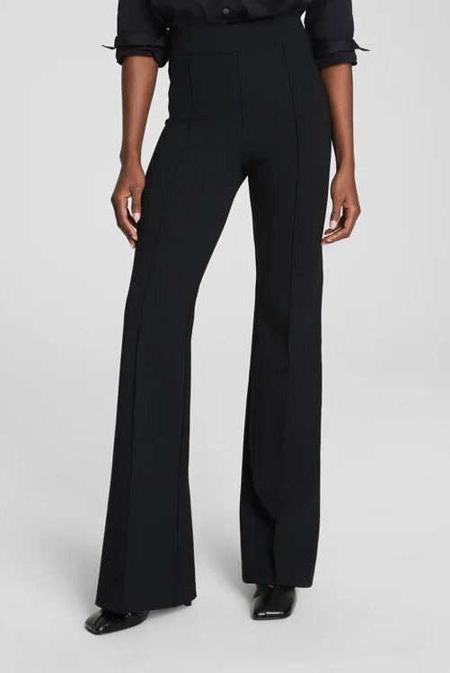 woman wearing a black long flared pants 