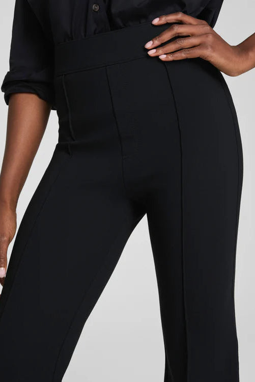 close-up of a black long flared pants 