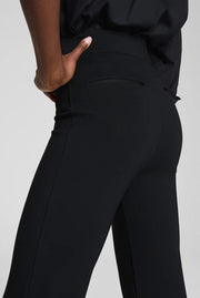 woman wearing a black long flared pants 