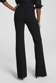woman wearing a black long flared pants 
