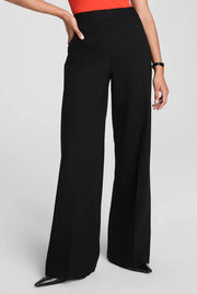 woman wearing black wide leg pants