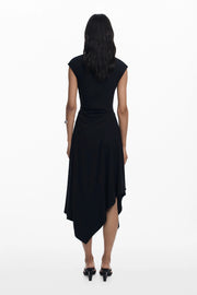 Back view of a woman wearing a asymmetrical floral dress