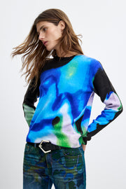 long sleeve pullover with an abstract water color in black, blue, green, and white with a crew neckline. 