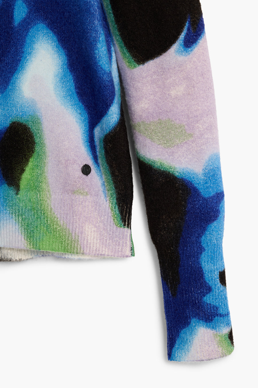 long sleeve pullover with an abstract water color in black, blue, green, and white with a crew neckline. 