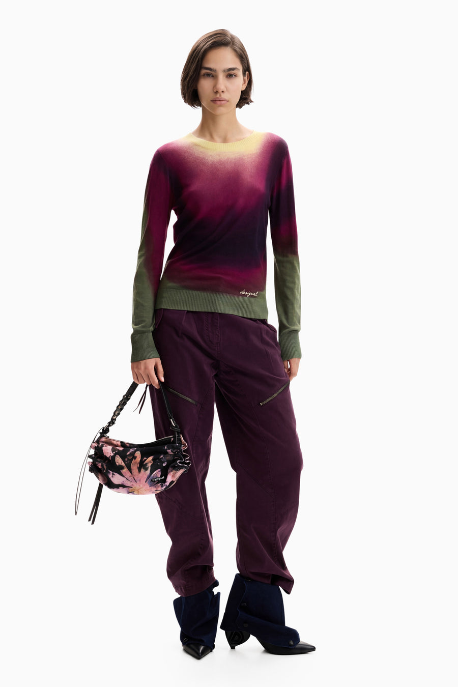 long sleeve lightweight knit sweater featuring an Ombre tie-dye print in pink, green, black, and yellow with a classic crew neckline