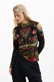 long sleeve mesh top with a vibrant botanical print with colorful florals and foliage on a black background 