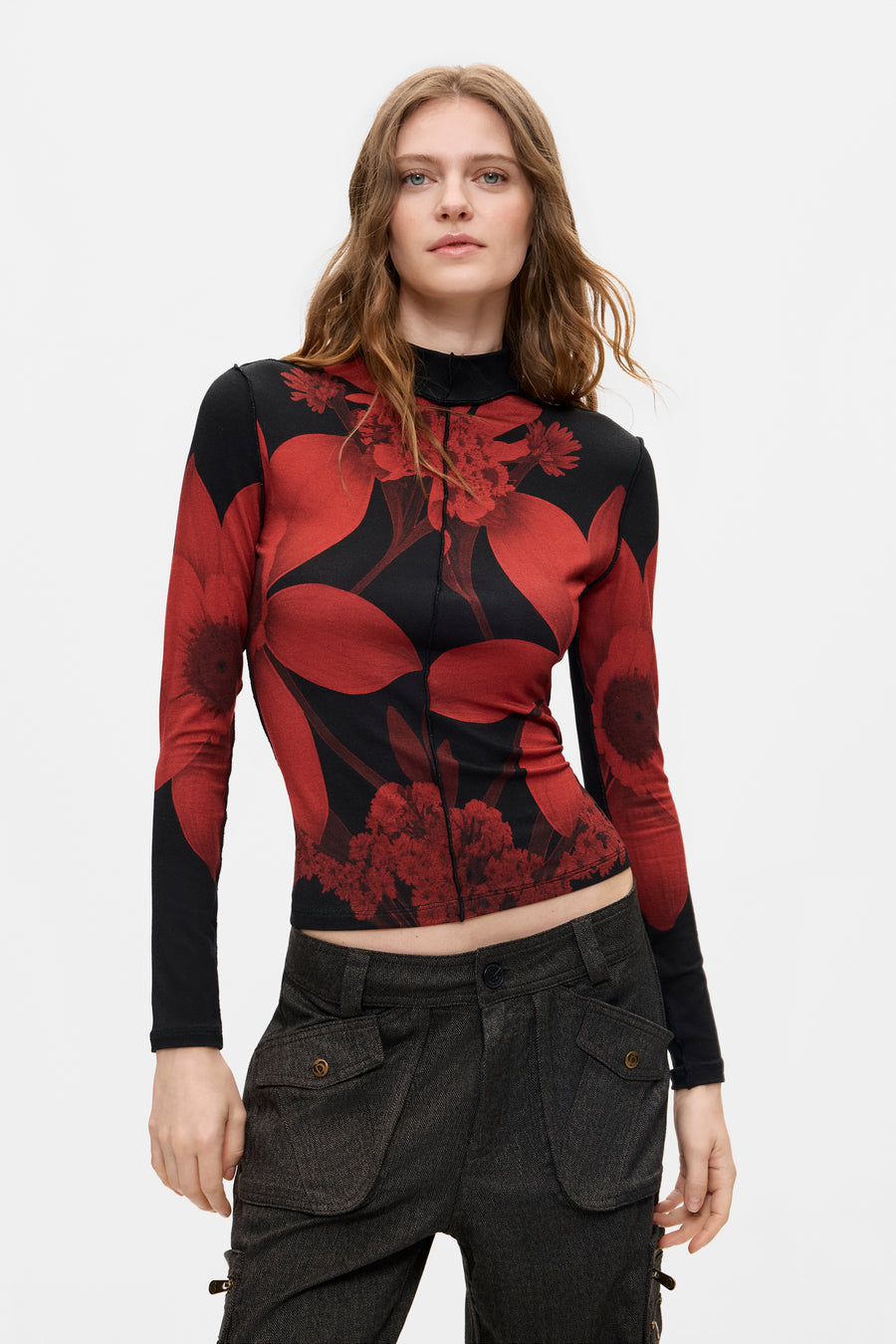 black sheer long sleeve top with red floral designs