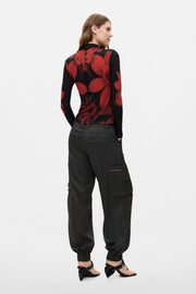 black sheer long sleeve top with red floral designs