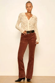 woman wearing brown high waited  pants 
