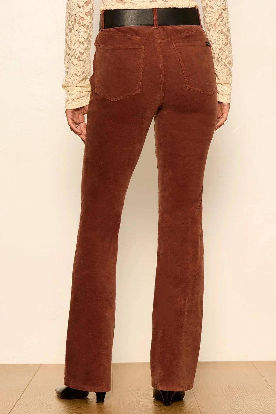 woman wearing brown high waited  pants 