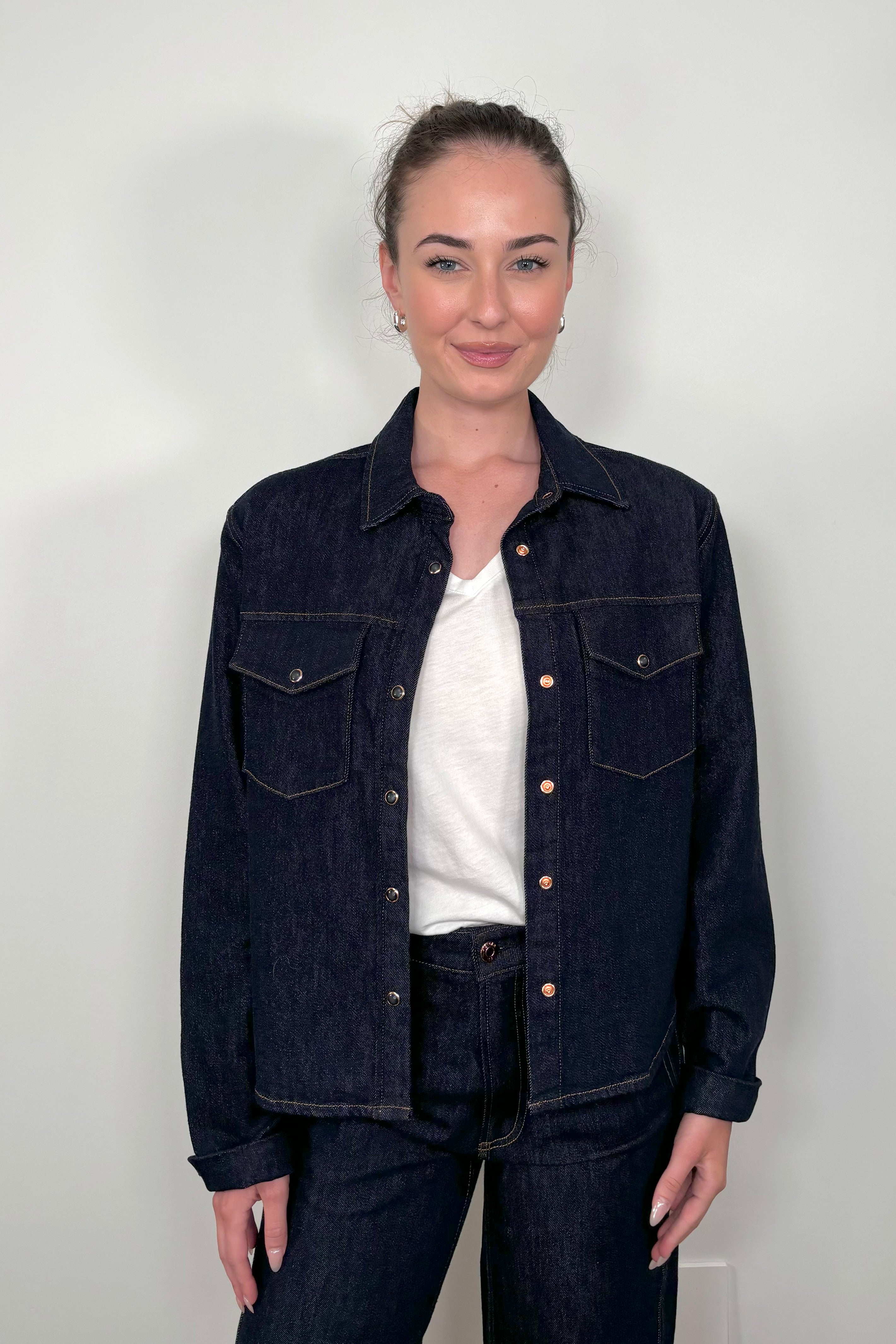 woman wearing dark wash denim jacket