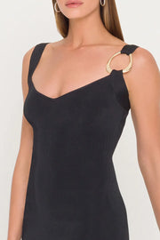 Close up of gold metal strap detail