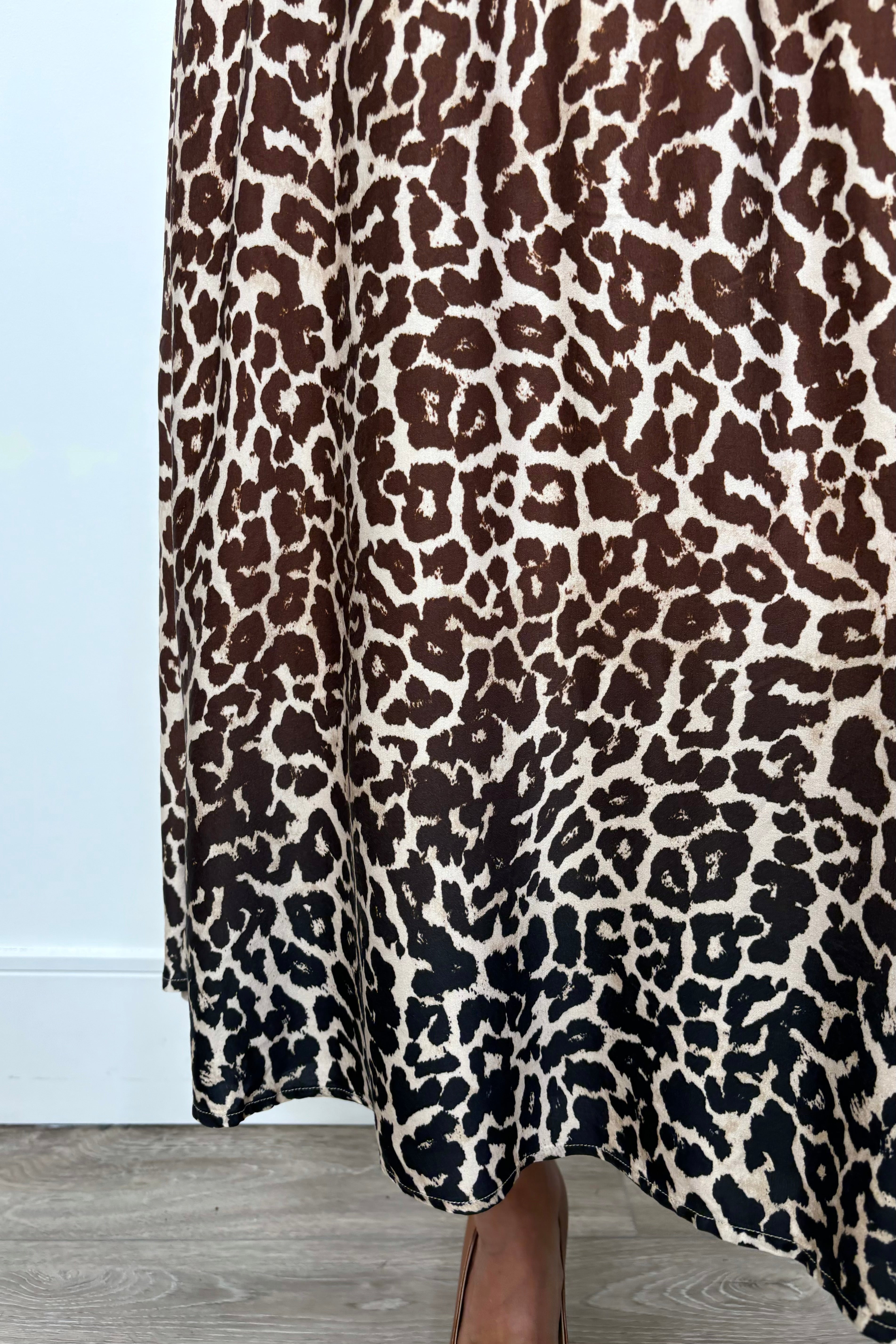 Close-up of a gathered leopard print long skirt