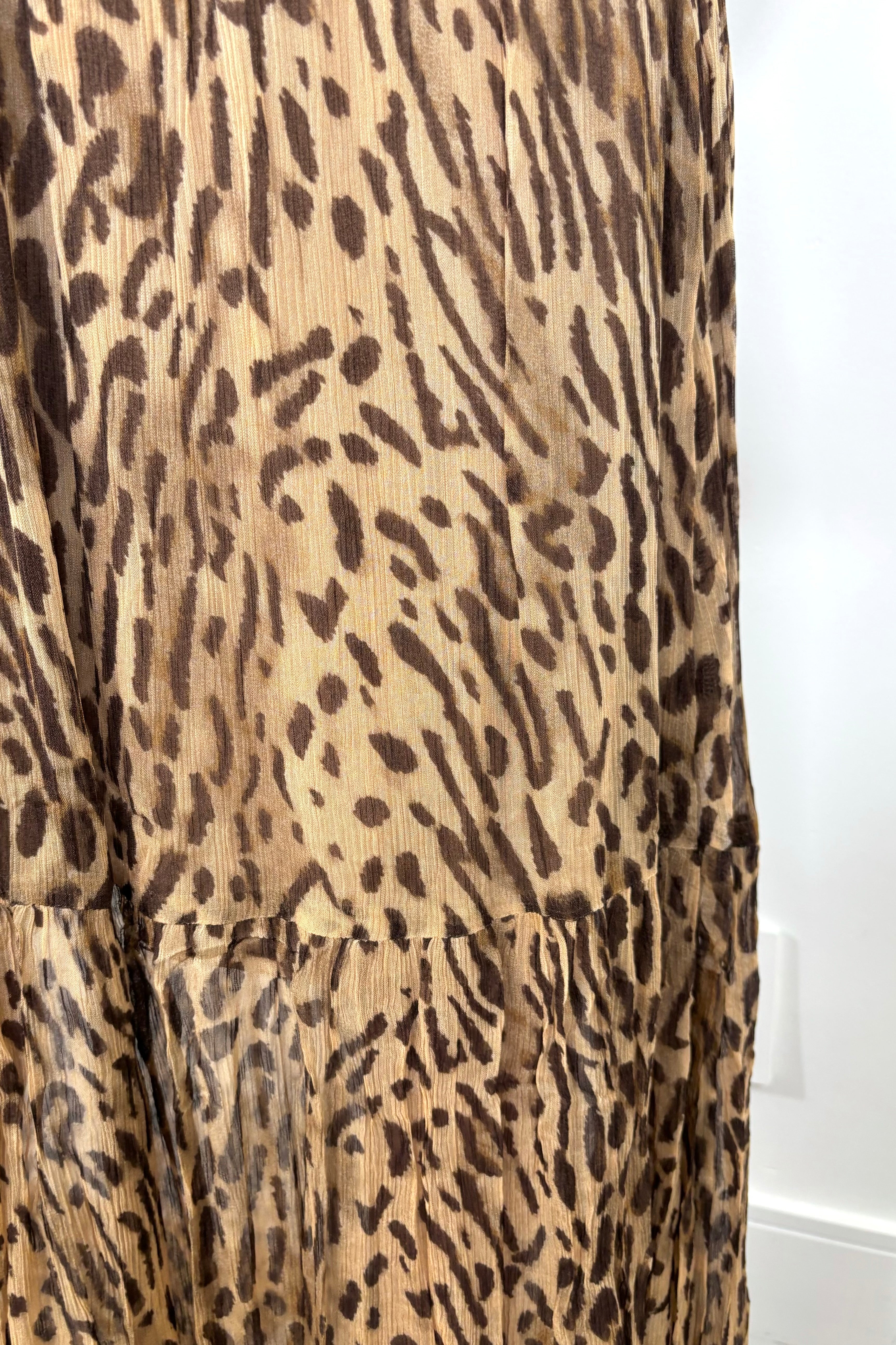 zoom in view of ruffles of a leopard printed maxi skirt