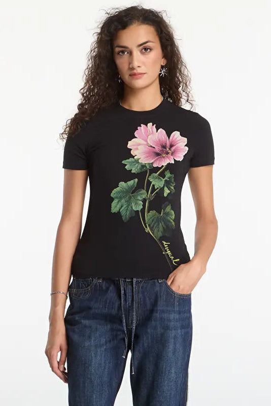 woman wearing a black tshirt with a pink flower on the front 